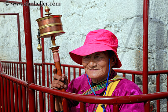 old-woman-w-prayer-pole.jpg