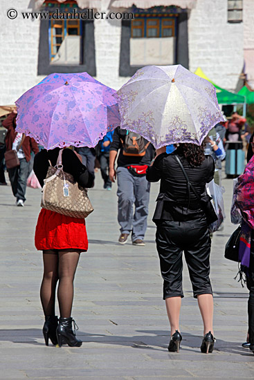 women-in-high-heels-w-umbrellas.jpg