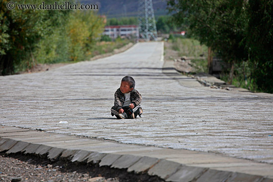 toddler-boy-in-road.jpg