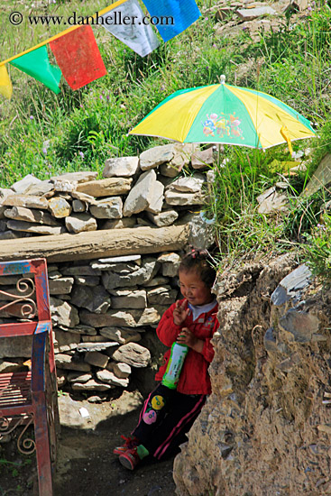 toddler-girl-under-umbrella.jpg