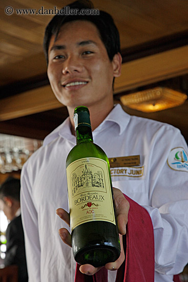 man-serving-white-wine-1.jpg