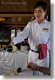 images/Asia/Vietnam/HaLongBay/Boats/VictoryShip/man-serving-white-wine-2.jpg