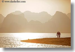 images/Asia/Vietnam/HaLongBay/Sunset/beach-walkers-n-mtns-1.jpg