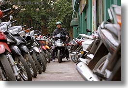 images/Asia/Vietnam/Hanoi/Bikes/People/driving-thru-motorcycles.jpg