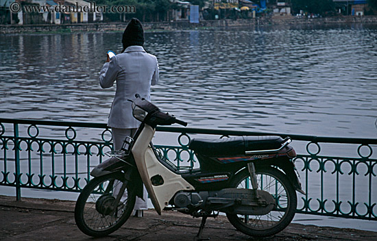 woman-w-mirror-n-motorcycle.jpg