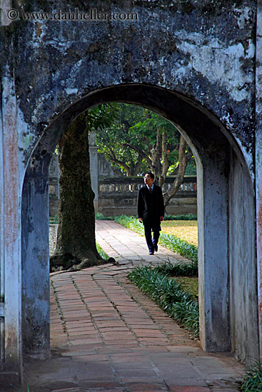 man-walking-thru-archway.jpg