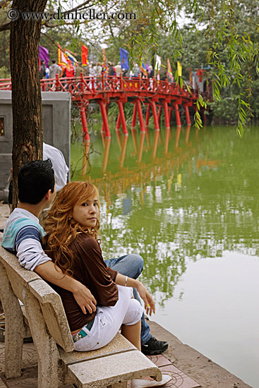 couple-on-bench-by-red-bridge.jpg
