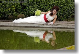 images/Asia/Vietnam/Hanoi/People/Couples/reclining-bride-w-flowers-by-water-2.jpg