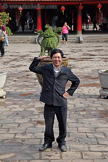 asian-man-waving-n-smiling.jpg