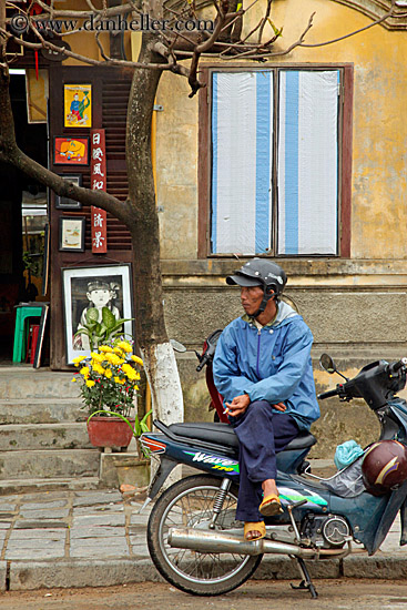 man-sitting-on-motorcycle-1.jpg