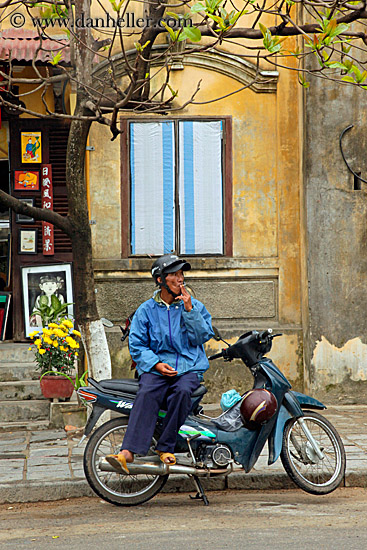 man-sitting-on-motorcycle-2.jpg