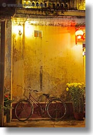 images/Asia/Vietnam/HoiAn/Bikes/red-bike-n-yellow-wall-at-nite.jpg