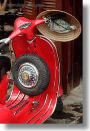 images/Asia/Vietnam/HoiAn/Bikes/red-moped-wheel-n-hat.jpg