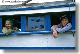 images/Asia/Vietnam/HoiAn/Boats/men-looking-out-boat-windows.jpg