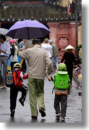 images/Asia/Vietnam/HoiAn/People/Kids/boys-walking-w-old-man-w-umbrella-2.jpg