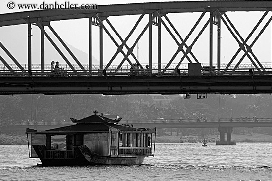 ferry-going-under-bridge-bw-1.jpg