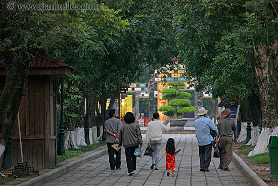 family-walking-thru-tree-tunnel-1.jpg