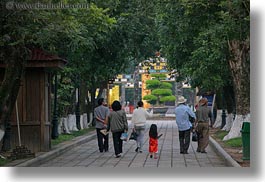 images/Asia/Vietnam/Hue/Citadel/family-walking-thru-tree-tunnel-1.jpg