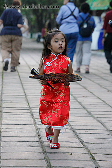 little-girl-in-red-w-fan.jpg