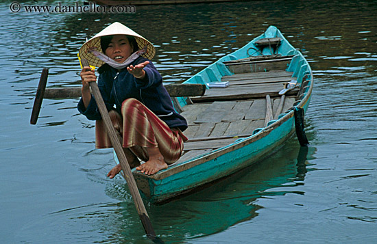 Women in Conical Hats in Boats (2)