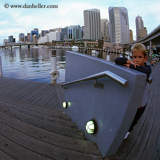 boy-n-pier-n-cityscape.jpg