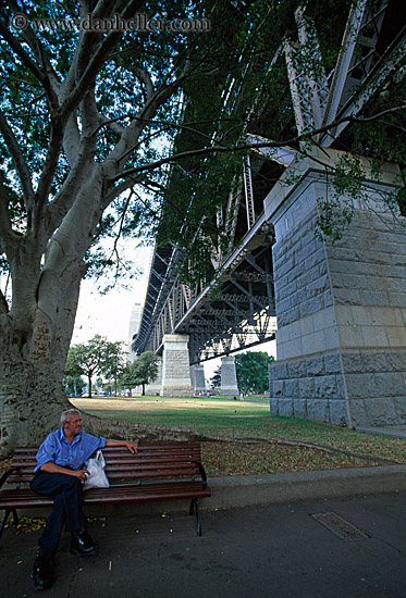 man-on-bnech-under-bridge.jpg