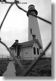 images/California/PigeonPointLighthouse/lighthouse-thru-fence-bw.jpg