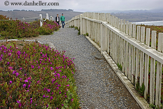 people-on-path-by-picket-fence.jpg