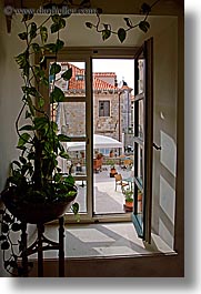 images/Europe/Croatia/Dubrovnik/DoorsWins/plant-around-window.jpg