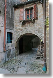images/Europe/Croatia/Groznjan/cobblestone-road-n-arch-w-window.jpg