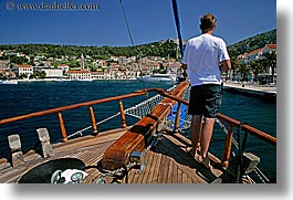 images/Europe/Croatia/Hvar/Scenics/man-on-boat-viewing-hvar.jpg