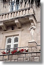 images/Europe/Croatia/Korcula/DoorsWindows/balcony-statue-n-flowers-1.jpg