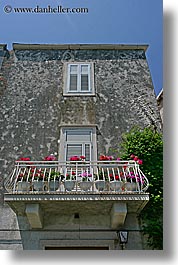 images/Europe/Croatia/Korcula/DoorsWindows/balcony-statue-n-flowers-2.jpg
