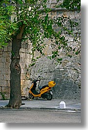 images/Europe/Croatia/Korcula/Misc/yellow-motorcycle-n-tree.jpg