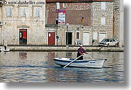 images/Europe/Croatia/Milna/Boats/man-rowing-n-town-1.jpg
