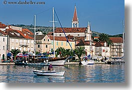 images/Europe/Croatia/Milna/Boats/man-rowing-n-town-2.jpg