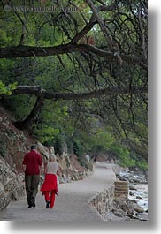 images/Europe/Croatia/Rab/Hiking/couple-walking-by-trees-n-water-1.jpg
