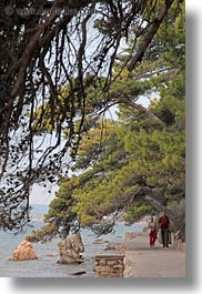 images/Europe/Croatia/Rab/Hiking/couple-walking-by-trees-n-water-3.jpg