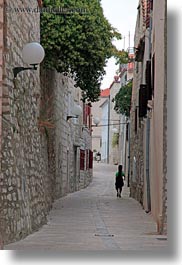 images/Europe/Croatia/Rab/musician-walking-narrow-street.jpg