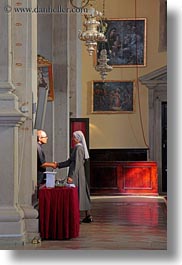 images/Europe/Croatia/Rovinj/Cathedral/nun-shaking-hands-w-man.jpg