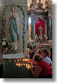 images/Europe/Croatia/Rovinj/Cathedral/women-n-candles-at-madonna-1.jpg