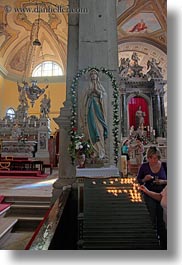 images/Europe/Croatia/Rovinj/Cathedral/women-n-candles-at-madonna-2.jpg