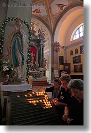 images/Europe/Croatia/Rovinj/Cathedral/women-n-candles-at-madonna-3.jpg