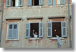 images/Europe/Croatia/Rovinj/People/woman-waving-from-window.jpg