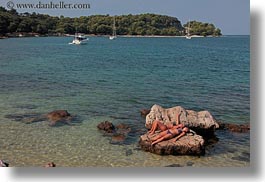 images/Europe/Croatia/Rovinj/People/women-sunbathing-on-rocks-by-water-2.jpg