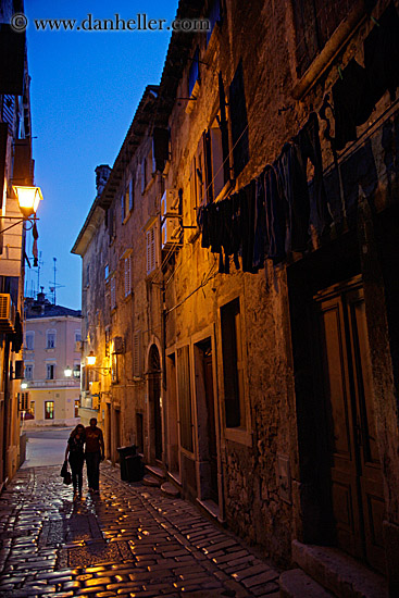 couple-walking-on-cobblestone-street-1.jpg