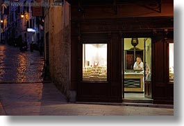 images/Europe/Croatia/Rovinj/Streets/woman-in-store-by-street.jpg