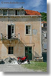 images/Europe/Croatia/Sipan/Misc/red-motorcycle-n-bldg.jpg