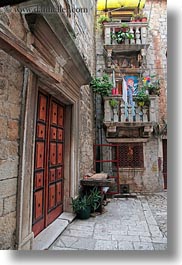 images/Europe/Croatia/Trogir/Buildings/ornate-door-n-stone-balconies.jpg