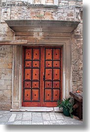 images/Europe/Croatia/Trogir/Buildings/wood-door-in-ornate-frame.jpg